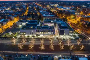 Aerial view large building trees christmas lights