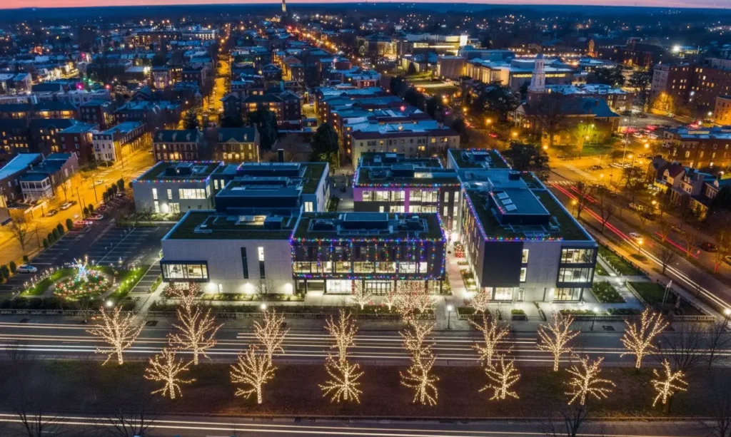 Aerial view large building trees christmas lights